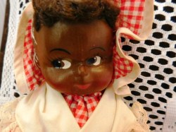 aa bed doll red check face